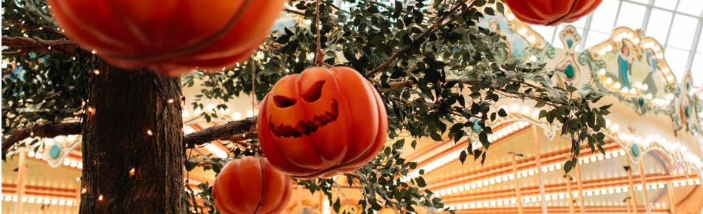 bright-pumpkin-with-a-scary-halloween-face-hanging-on-a-tree-with-garlands.jpg_s=1024x1024&w=is&k=20&c=FXrxs8nZd4sGtl756G43D5F7mfPBPXioof6aDf7sqlo=.jpg